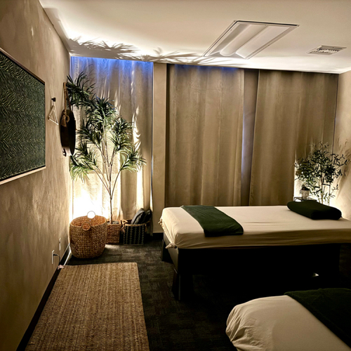 Warm massage room at The Emerald Healing Center
